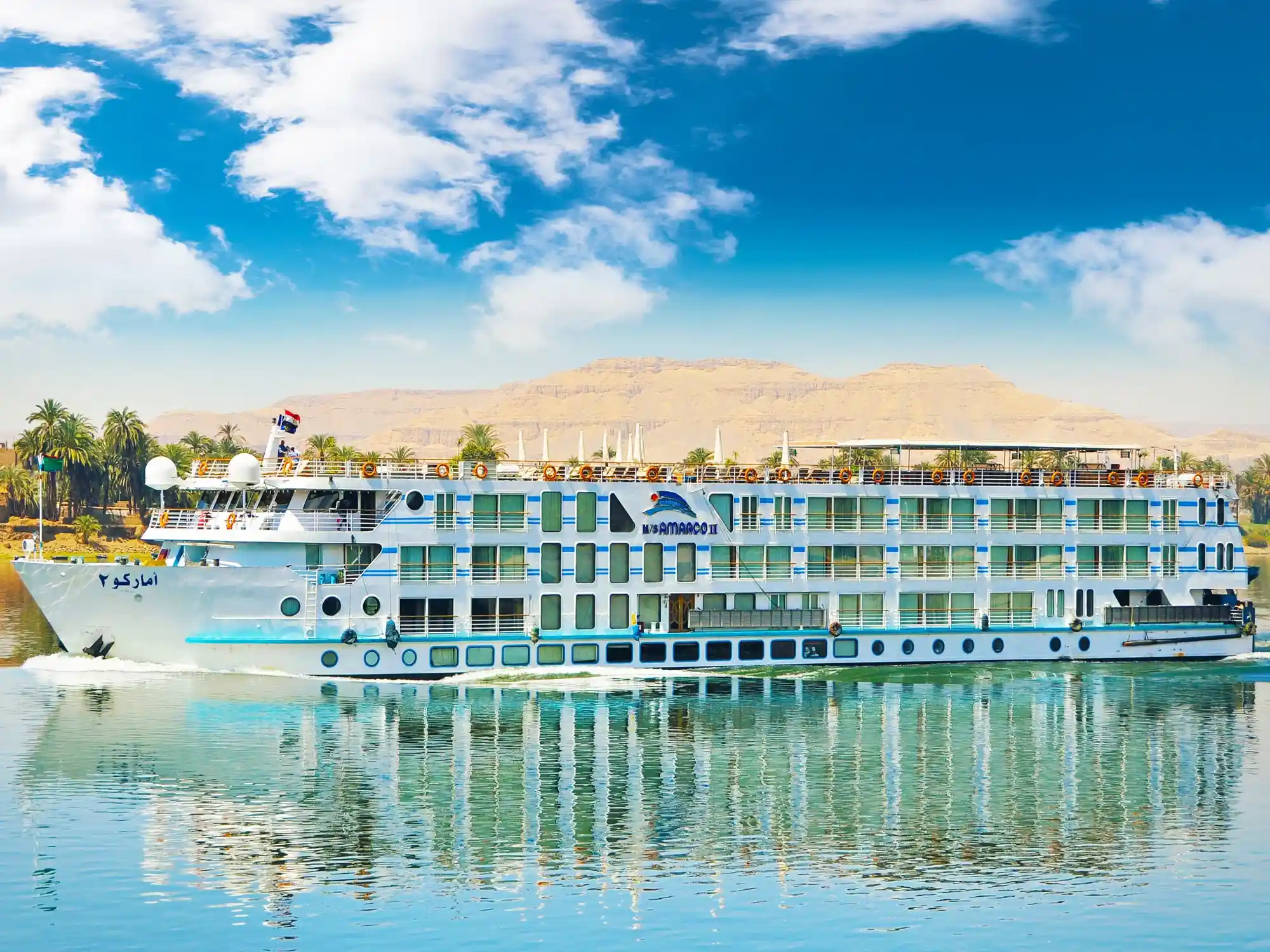 Family-friendly Nile cruise ship sailing near Luxor