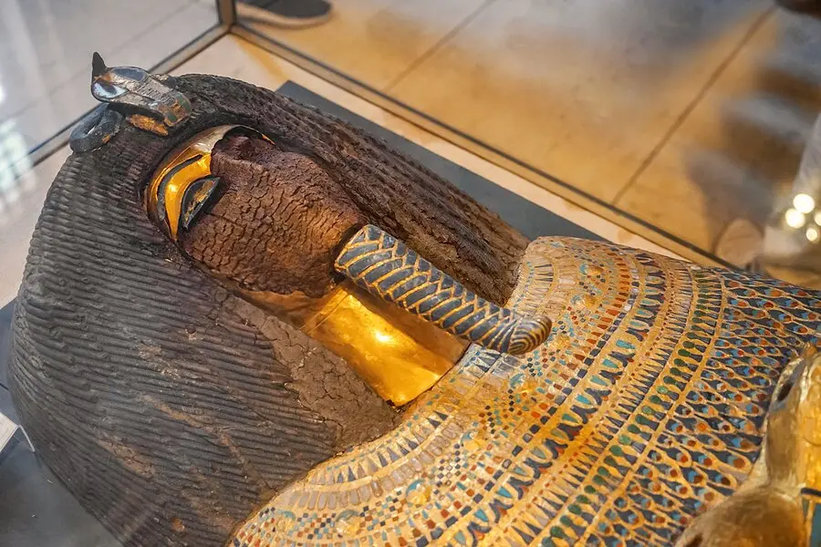 Ancient Egyptian royal coffin displayed in a Cairo museum