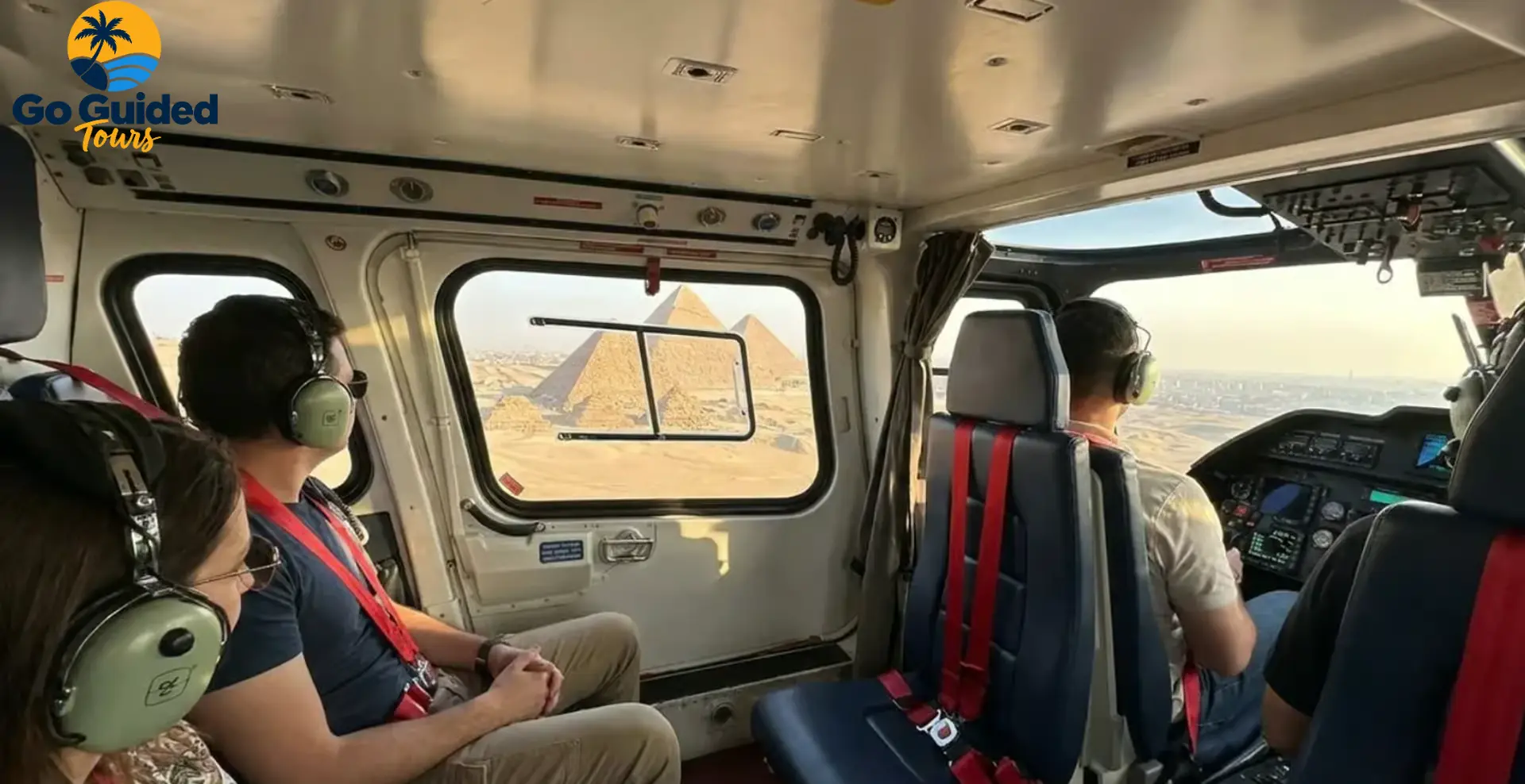 Passengers viewing the Pyramids of Giza during a private helicopter flight